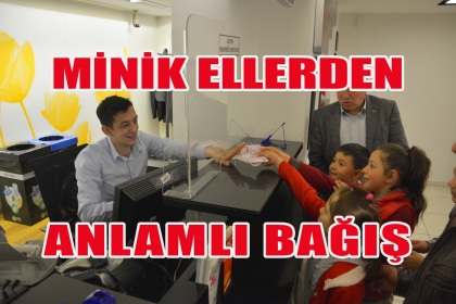 DEMİRCİ'NİN MİNİK ELLERİNDEN ANLAMLI BAĞIŞ